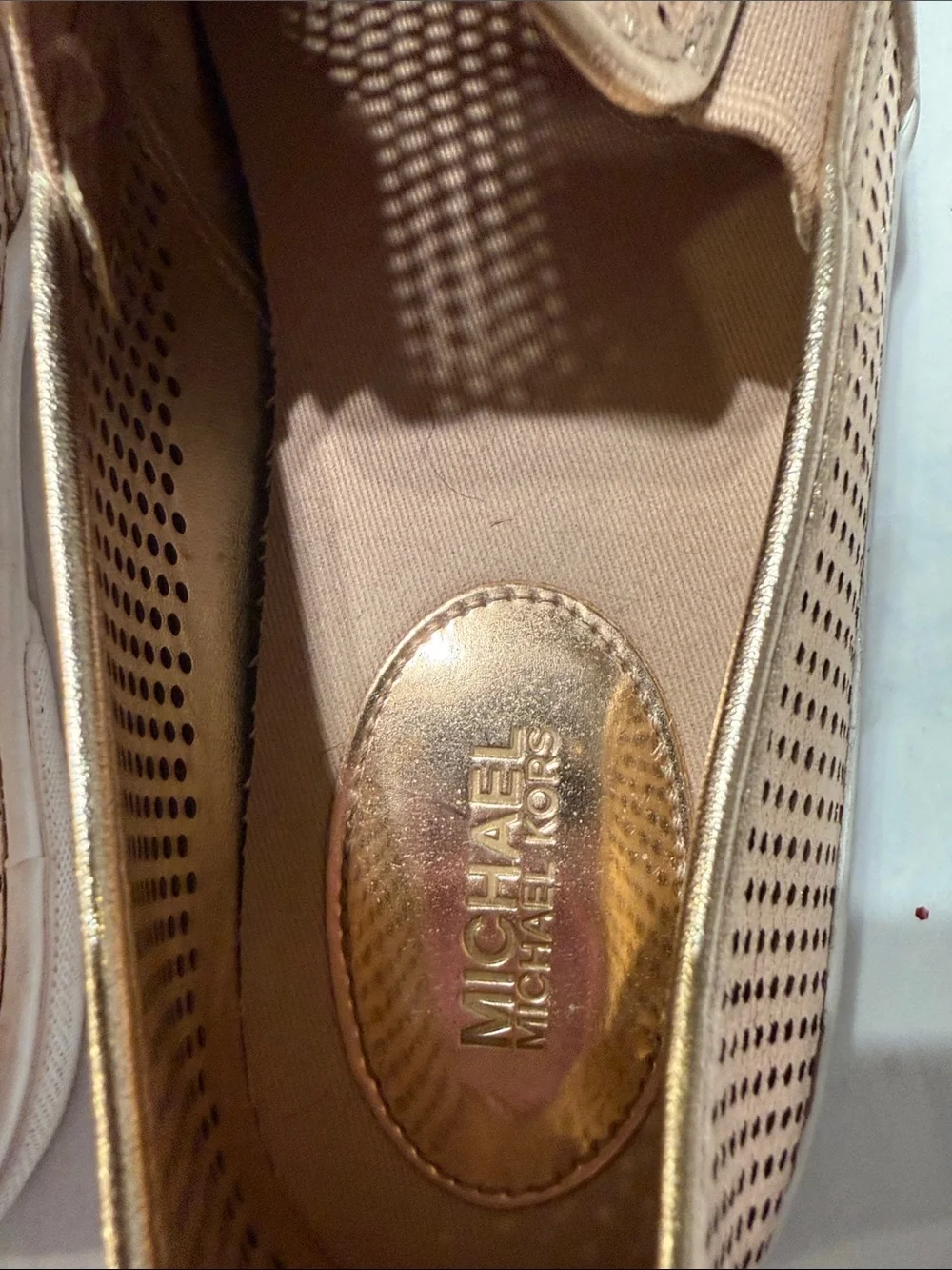 Michael Kors Metallic Rose Gold Perforated Slip-On Sneakers
